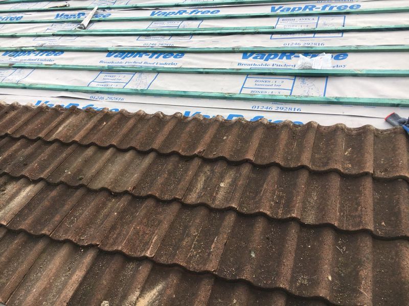a roof being reroofed